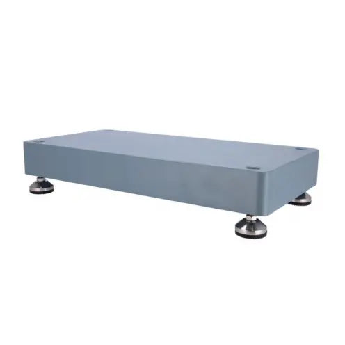 Rectangular metal box with rounded corners and metallic feet on a white background